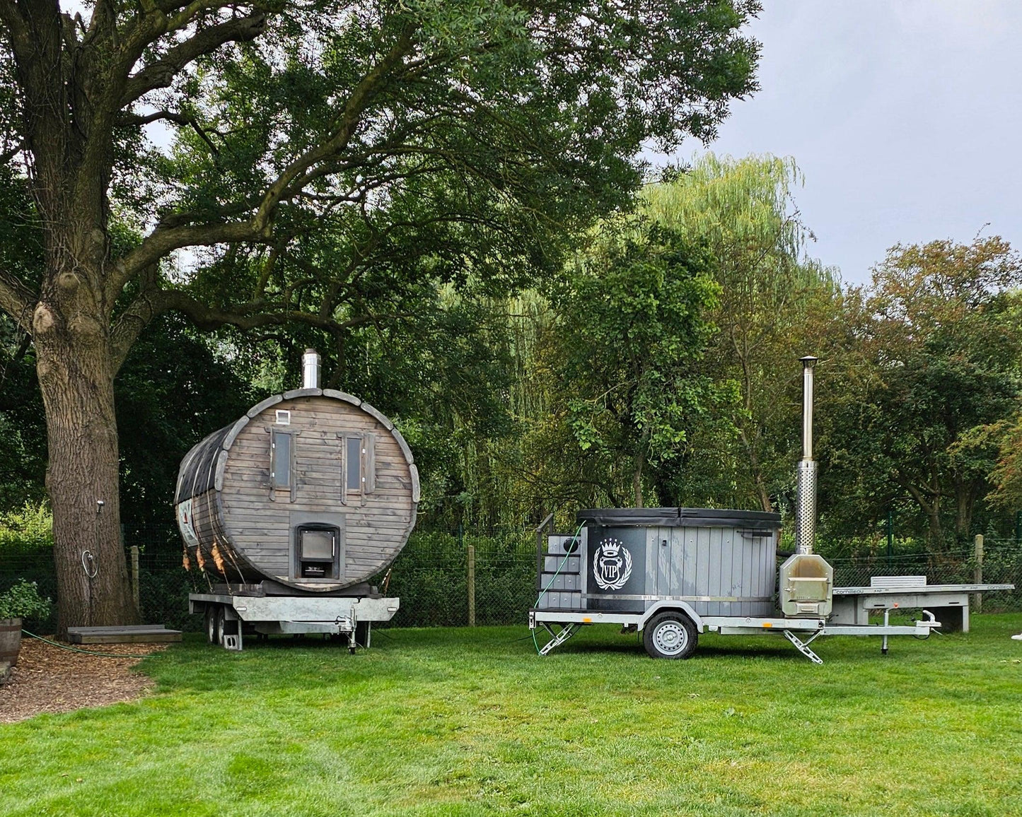 Mobile wood-fired sauna and hot tub delivery in East Anglia garden