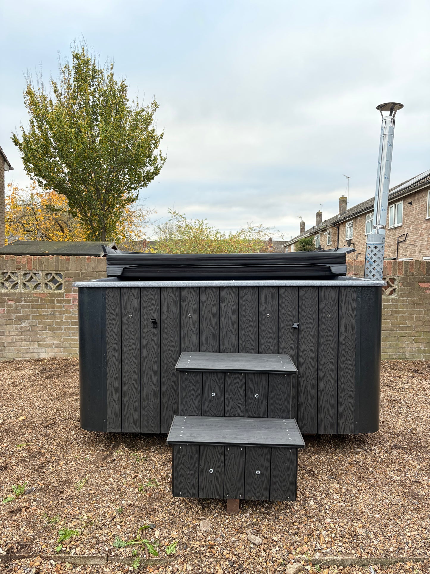 Rectangular Wood-Fired Hot Tub with Integrated Log Burner