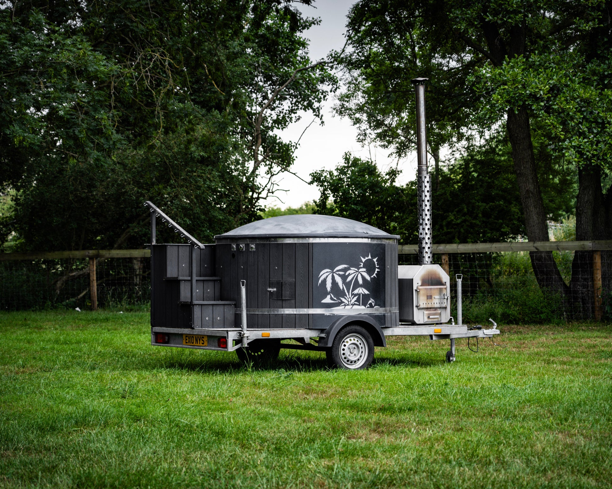 Hot Tub set up in a field for Customers to use on a weekend 