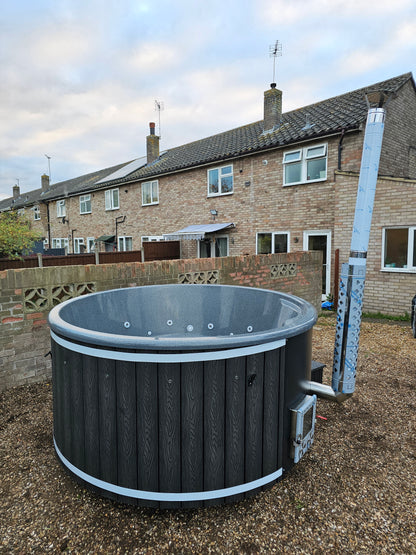 Round Wood-Fired Hot Tub with Integrated Log Burner