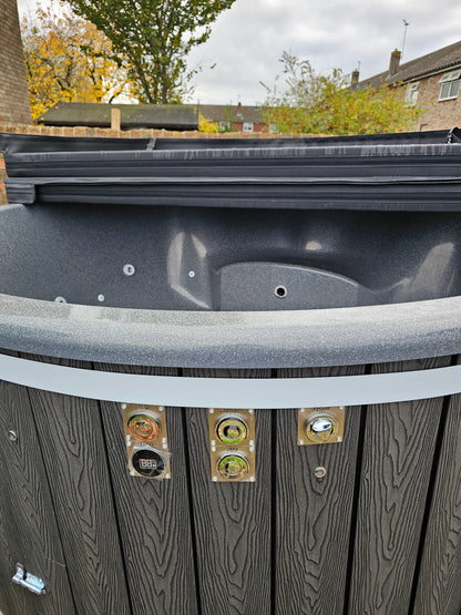 Round Wood-Fired Hot Tub with Integrated Log Burner