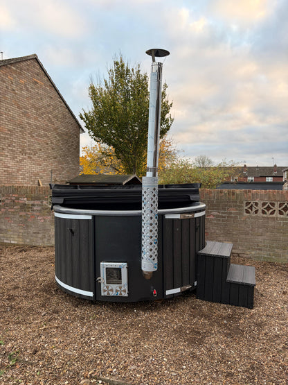 Round Wood-Fired Hot Tub with Integrated Log Burner