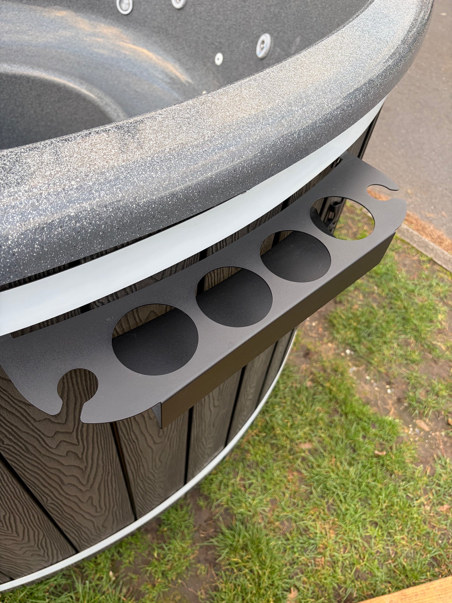 Round Wood-Fired Hot Tub with Integrated Log Burner