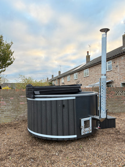 Round Wood-Fired Hot Tub with Integrated Log Burner